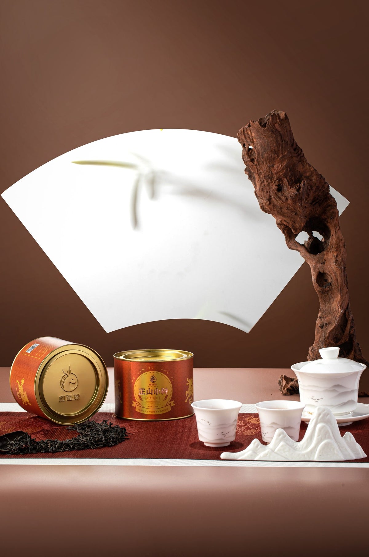 Lapsang Souchong tins with gaiwan tea setting